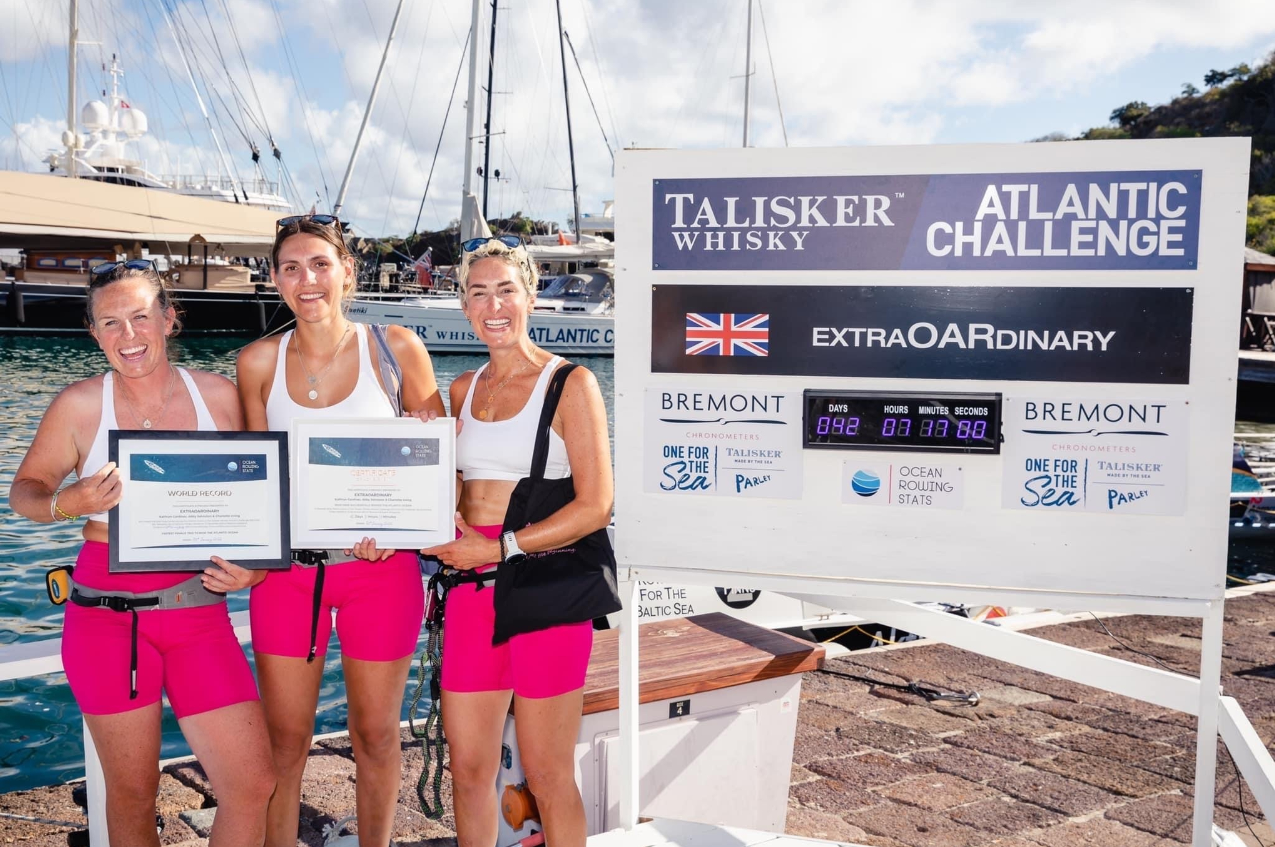 Team ExtraOARdinary with their certificates for completing the Talisker Whisky Atlantic Challenge