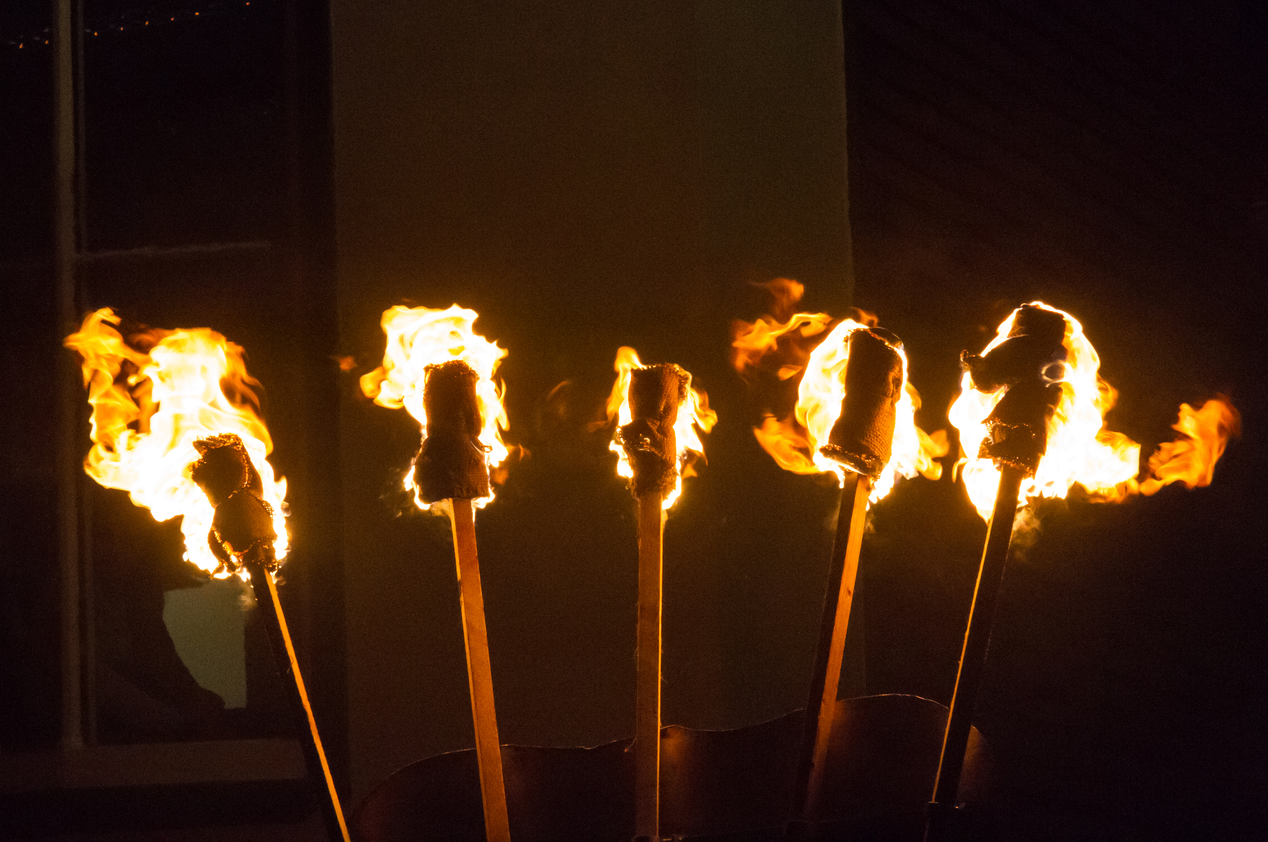 A line of burning torches